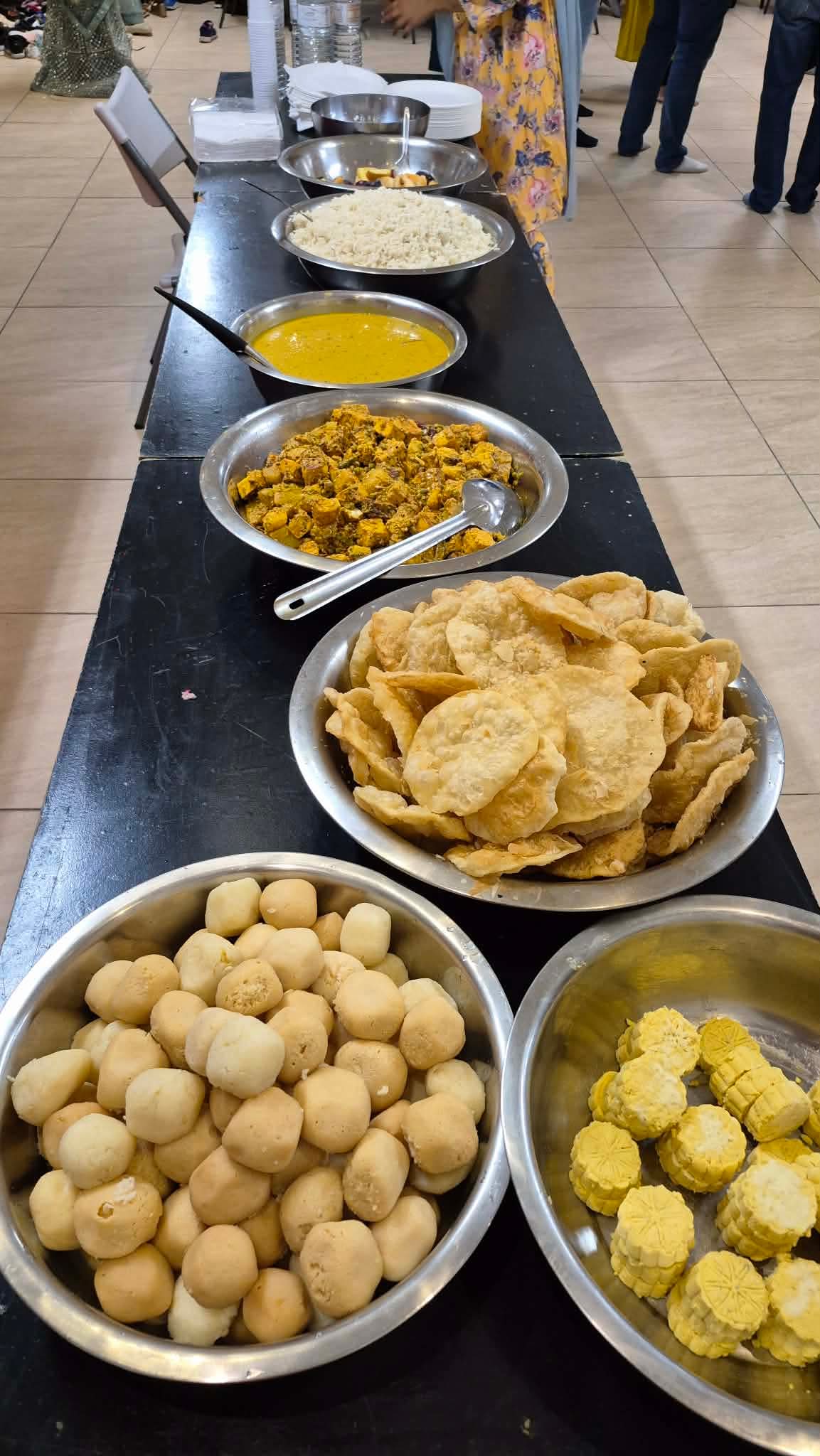 Bhog being served