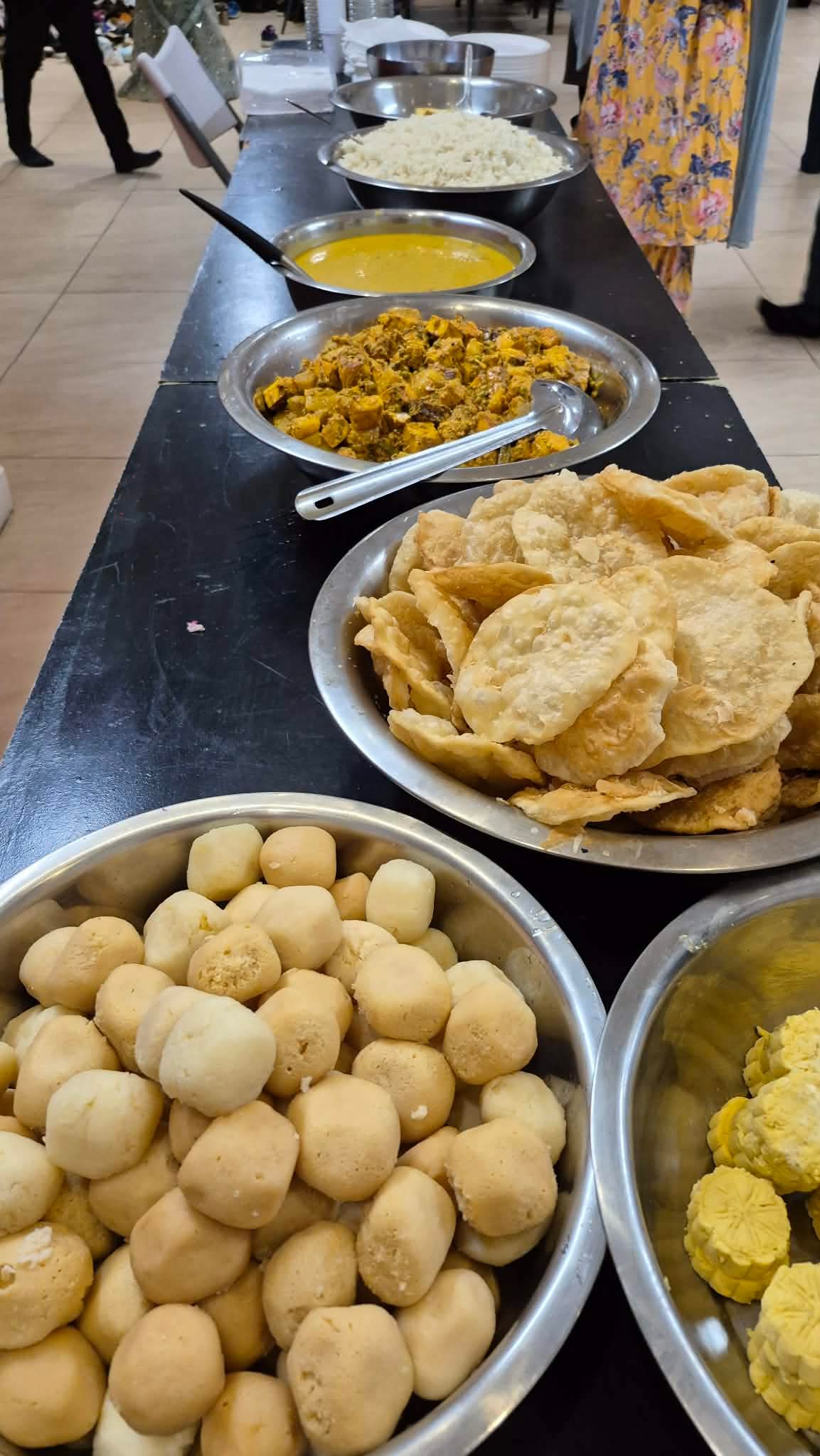 Bhog being served
